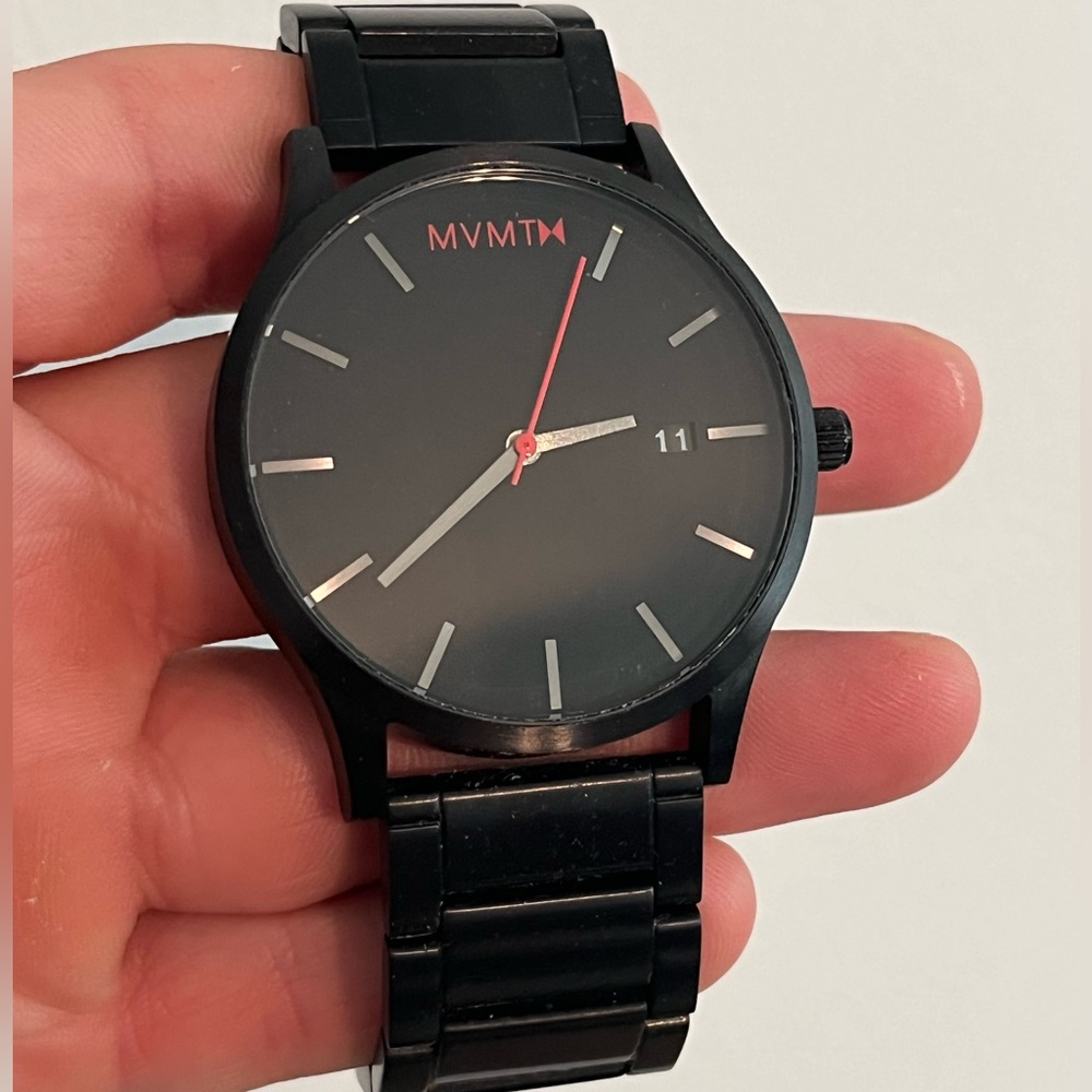 Lightly used MVMT watch. Black watch red accented second hand